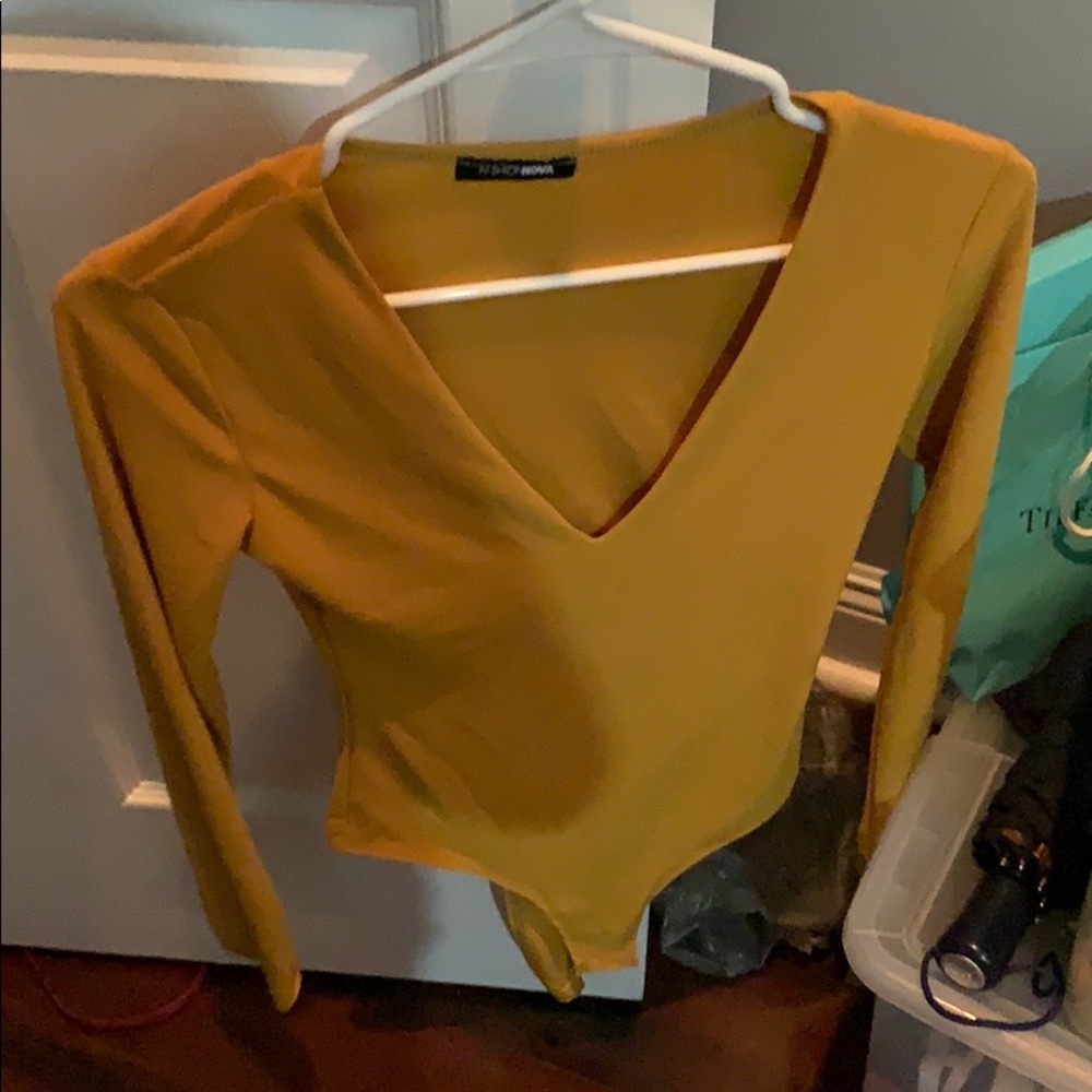 Size small mustard color bodysuit